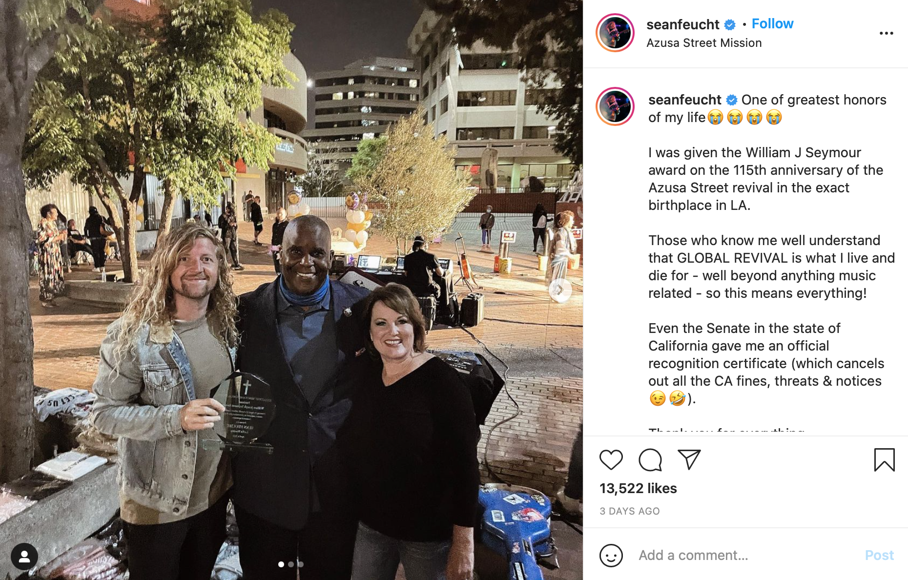 Sean Feucht holding an award plaque
